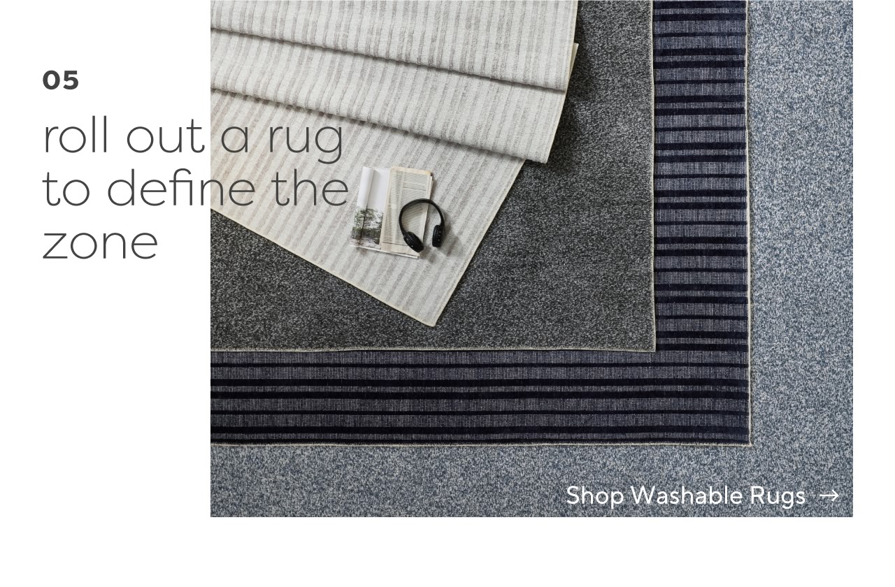 Roll out a rug to define the zone